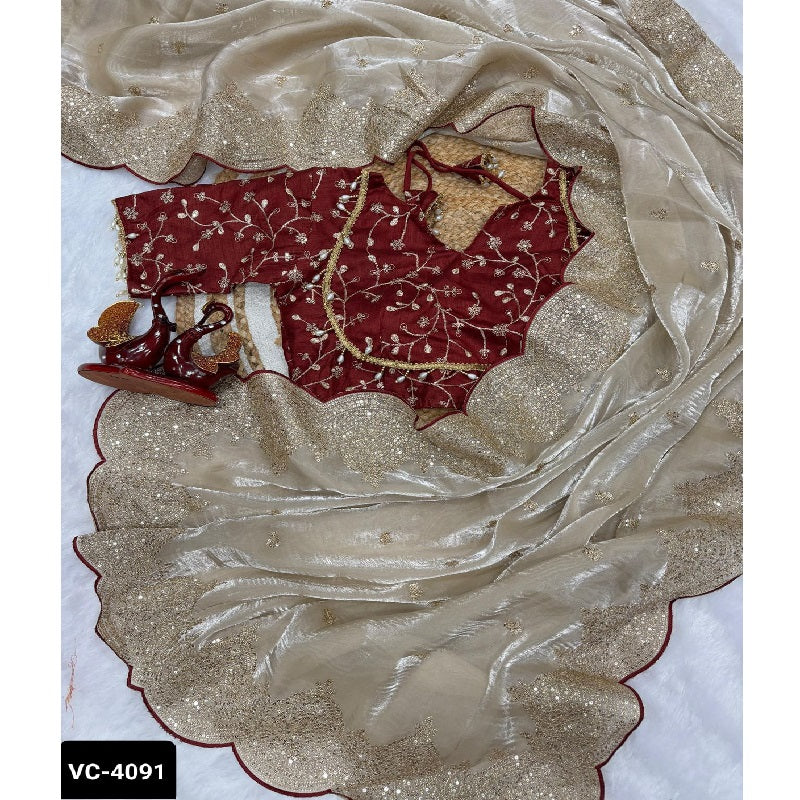 Heavy soft silk fabric saree with arco cut work border